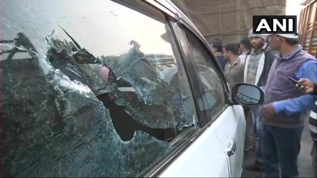 Vehicles parked near BJP president Amit Shah’s rally venue in East Midnapore were vandalised during the public event on Tuesday.(Photo: Twitter/@ANI)