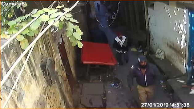 The CCTV footage of the suspects showed them running in the street and the victims following them, police said. (Video grab) The CCTV footage of the suspects showed them running in the street and the victims following them, police said. (Video grab)