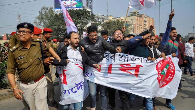 All Assam Students’ Union (AASU) activists are detained by police while trying to block NH 37 near Basistha during a protest against the recent attack on AASU members at Ghagrapar by alleged BJP activists, in Guwahati. (PTI) All Assam Students’ Union (AASU) activists are detained by police while trying to block NH 37 near Basistha during a protest against the recent attack on AASU members at Ghagrapar by alleged BJP activists, in Guwahati. (PTI)