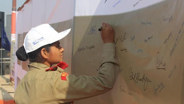 With a target of obtaining over 1.5 lakh signatures, the campaign was launched on the third and final day of ‘She is the Solution: Summit of Grace’ in the Kumbh Mela area. (HT Photo) With a target of obtaining over 1.5 lakh signatures, the campaign was launched on the third and final day of ‘She is the Solution: Summit of Grace’ in the Kumbh Mela area. (HT Photo)