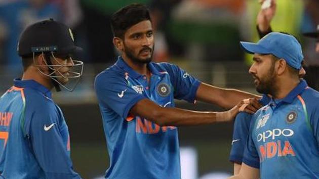 File image of Khaleel Ahmed with MS Dhoni (L). (AFP) File image of Khaleel Ahmed with MS Dhoni (L). (AFP)