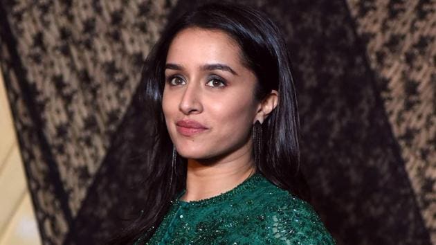 Shraddha Kapoor poses for a picture during the wedding reception of film producer Mukesh Bhatt's daughter Sakshi Bhatt.(AFP)