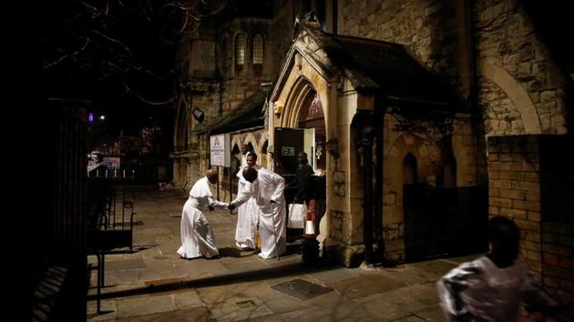 Worshippers greet each other following a nighttime Christmas Eve service at the Celestial Church of Christ in Elephant and Castle in London. Reflecting the different waves of migration to Britain in the 20th Century, Caribbean churches began to appear in the late 1940s and 1950s as workers and their families arrived from Jamaica and other former British colonies. (Simon Dawson / REUTERS) Worshippers greet each other following a nighttime Christmas Eve service at the Celestial Church of Christ in Elephant and Castle in London. Reflecting the different waves of migration to Britain in the 20th Century, Caribbean churches began to appear in the late 1940s and 1950s as workers and their families arrived from Jamaica and other former British colonies. (Simon Dawson / REUTERS)