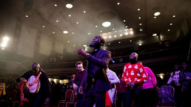 Worshippers dance during ‘Super Sunday’ service at the House of Praise church. For some, the noise from amplified services is a problem, leading to complaints to local authorities from residents. But many churches face bigger challenges than unhappy neighbours: Some provide food for people struggling to make ends meet, or work with young people at risk of recruitment by gangs. (Simon Dawson / REUTERS) Worshippers dance during ‘Super Sunday’ service at the House of Praise church. For some, the noise from amplified services is a problem, leading to complaints to local authorities from residents. But many churches face bigger challenges than unhappy neighbours: Some provide food for people struggling to make ends meet, or work with young people at risk of recruitment by gangs. (Simon Dawson / REUTERS)
