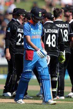India's Shubman Gill (C) walks off after being dismissed during the fourth one-day international cricket match between New Zealand and India at Seddon Park in Hamilton. (AFP) 