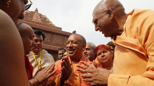 Chief Minister of Uttar Pradesh Yogi Adityanath meets religious leaders at the Sangam, the confluence of rivers Ganges and Yamuna, during the Kumbh Mela in Prayagraj, India, Thursday. (AP) Chief Minister of Uttar Pradesh Yogi Adityanath meets religious leaders at the Sangam, the confluence of rivers Ganges and Yamuna, during the Kumbh Mela in Prayagraj, India, Thursday. (AP)