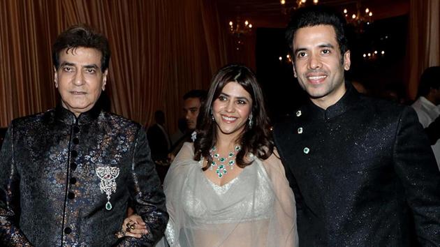 Jitendra Kapoor (L), producer Ekta Kapoor (C) and actor Tusshar Kapoor (R) at the wedding reception of Isha Ambani in Mumbai. (AFP)(AFP)