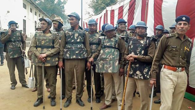 Security personnel stand guard during the counting of votes for by-election in Jind. BJP’s Krishan Middha emerged victorious in the Jind by-polls. On the other hand, Shafia Zubair from Congress won the by-elections for the Ramgarh assembly constituency. (PTI) Security personnel stand guard during the counting of votes for by-election in Jind. BJP’s Krishan Middha emerged victorious in the Jind by-polls. On the other hand, Shafia Zubair from Congress won the by-elections for the Ramgarh assembly constituency. (PTI)