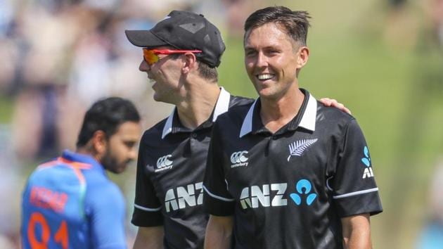 New Zealand's Trent Boult, right, is congratulated on taking an Indian wicket during their one day international cricket match at Seddon Park in Hamilton.(AP)