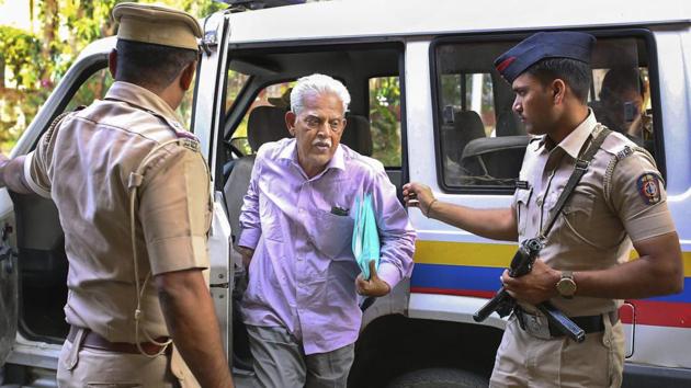 Maharashtra police on Thursday produced noted poet and Maoist sympathiser, Varavara Rao and Nagpur-based lawyer Surendra Gadling in a local court in Gadchiroli in connection with a case related to burning of 75 trucks near Surajgarh allegedly by Maoists.(PTI)