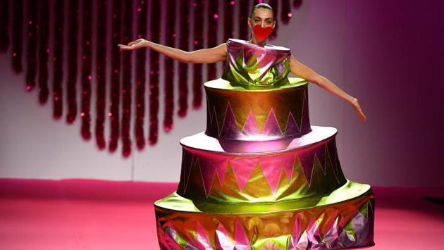 A model displays an outfit of Spanish designer Agatha Ruiz De La Prada’s Autumn/Winter 2019 collection during the Madrid Mercedes Benz Fashion Week. (Gabriel Bouys / AFP)