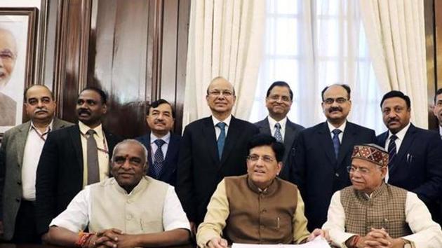 Piyush Goyal with members of his budget 2019 team at North Block in New Delhi.(Bloomberg)