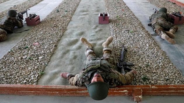 Afghan National Army (ANA) soldiers take part in a training exercise at the Kabul Military Training Centre (KMTC) in Kabul, Afghanistan. (Omar Sobhani / REUTERS)