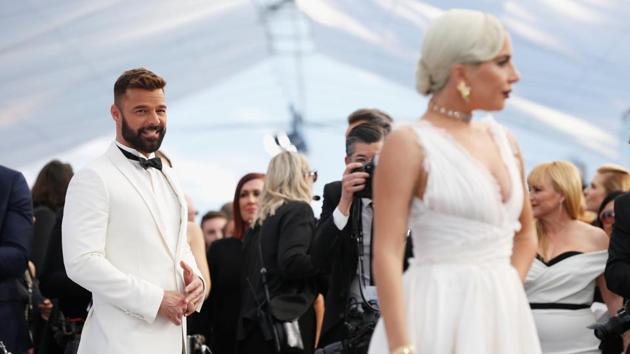 Singer Ricky Martin looks on at singer Lady Gaga at the 25th Screen Actors Guild Awards in Los Angeles, California. (Mario Anzuoni / REUTERS)