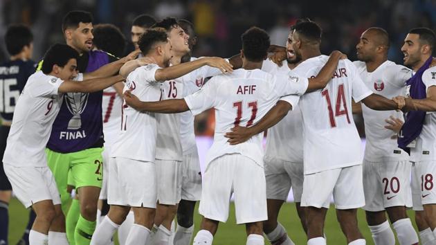 Players of Qatar run to celebrate after winning the AFC Asian Cup final match between Japan and Qatar in Zayed Sport City in Abu Dhabi, United Arab Emirates.(AP)