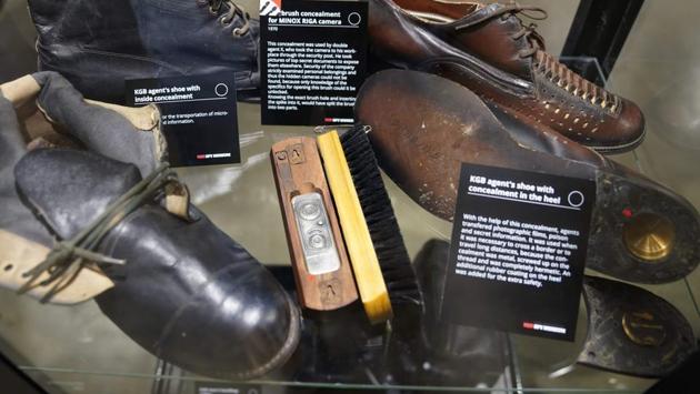 Specially purposed shoes on display at The KGB Spy Museum. As an optional extra, visitors can take a tour with a Russian-speaking guide -- such as Sergei Kolosov, a former detective with the Saint Petersburg police who remembers using some of the items on show. Urbaitis and his daughter Agne Urbaityte, 29, describe themselves as co-curators of the show, whose owner is an American company which wishes to remain anonymous. (Timothy A. Clary / AFP)