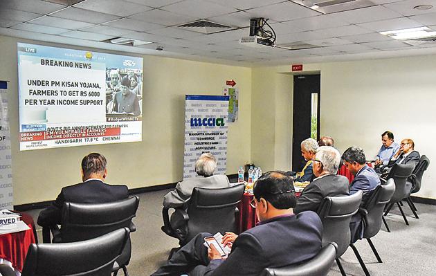 Businessmen from Pune watch the budget session screened at Mahratta Chamber of Commerce, Industries and Agriculture (MCCIA) on Friday.(Sanket Wankhade/HT PHOTO)