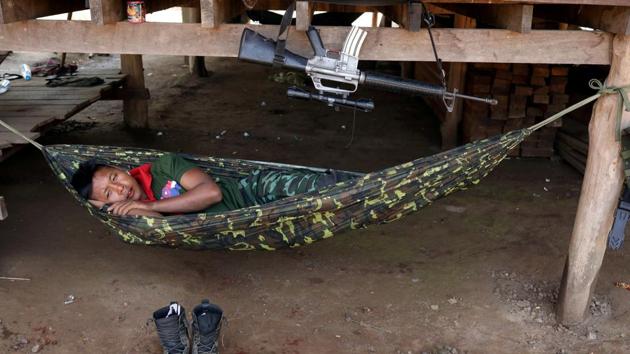 A soldier of Karen National Union (KNU) takes rest during the 70th anniversary of Karen National Revolution Day in Kaw Thoo Lei, Kayin state, Myanmar. (Ann Wang / REUTERS)