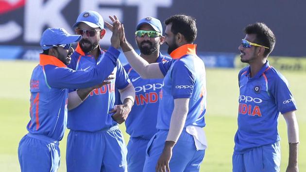 File image of cricketers of Indian cricket team celebrating the fall of a wicket.(AP)