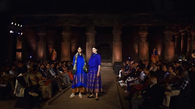 Models showcase dresses made from traditional Indian fabrics based on GI (Geographical Indication) textiles drawn from various regions across India during an event “Artisan Speak”, at the UNESCO World Heritage site of Elephanta Caves near Mumbai, Maharashtra. (Anshuman Poyrekar / HT Photo)