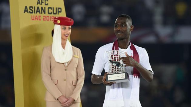 Qatar's forward Almoez Ali poses with the Top Goalscorer award. (AFP) Qatar's forward Almoez Ali poses with the Top Goalscorer award. (AFP)