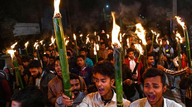 Activists of All Assam Students Union (AASU) along with 30 indigenous organizations take out a torch light procession to protest against the Citizenship Amendment bill in Guwahati on January 31.(AFP Photo) Activists of All Assam Students Union (AASU) along with 30 indigenous organizations take out a torch light procession to protest against the Citizenship Amendment bill in Guwahati on January 31.(AFP Photo)