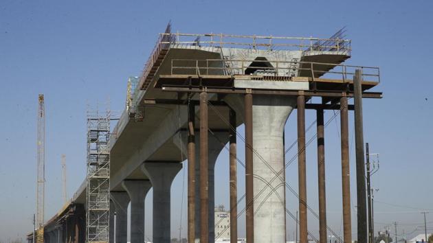 The National Democratic Alliance (NDA) government has pegged a budgetary allocation of about ₹4.56 lakh crore for the infrastructure sector, including roadways, railways, shipping and aviation.(AP) The National Democratic Alliance (NDA) government has pegged a budgetary allocation of about ₹4.56 lakh crore for the infrastructure sector, including roadways, railways, shipping and aviation.(AP)