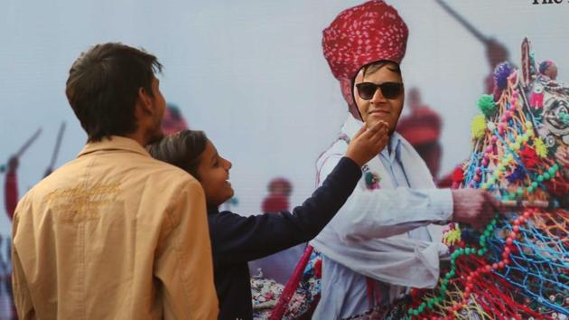 Visitors interact playfully with the cut outs at ZEE Jaipur Literature Festival 2019, at Diggi Palace, in Jaipur, Rajasthan. (Himanshu Vyas / HT Photo)