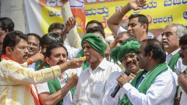 BJP leader offer sweets to farmers during celebrations for the Union Budget announcements, in Bengaluru on February 2. (AP Photo/ Representative Image) BJP leader offer sweets to farmers during celebrations for the Union Budget announcements, in Bengaluru on February 2. (AP Photo/ Representative Image)