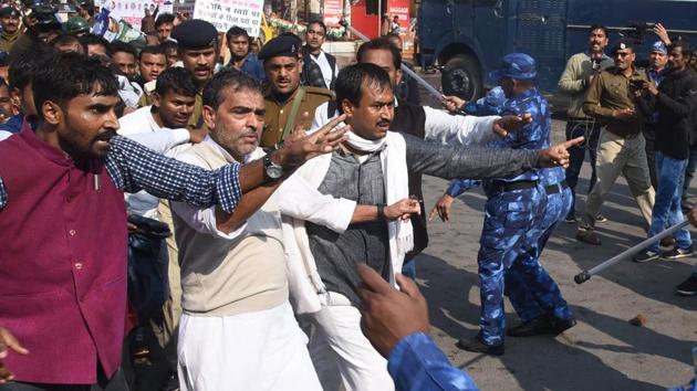 Patna Bihar-Feb.2,2019-Patna policemen are doing lathi charge on Rashtriya Lok Samata Party national president Upendra Kushwaha and party workers during their Raj Bhawan march for improvement education system at Dak Bungalow crossing in Patna Bihar India on Saturday Feb 02,2019.(Photo santosh Kumar / Hindustan Times)(HT Photo)