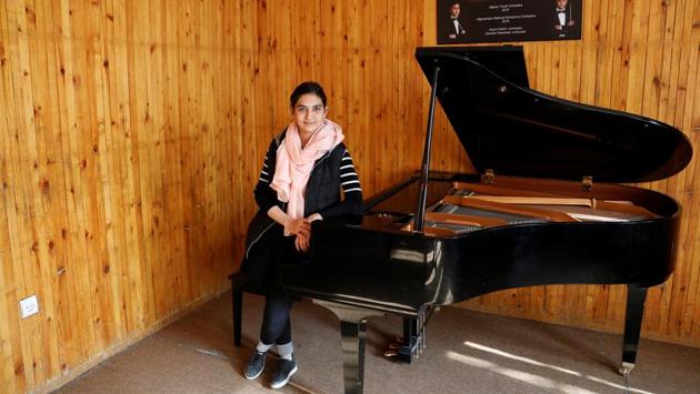 Maram Atayee, 16, is a pianist at the Afghan National Institute of Music. “The thing I'm most worried about is that if they return, I'll not be able to continue playing music,” Atayee said. “It will be great if the government and the Taliban reach a peace deal. At that time there should be access to music for everyone and women’s rights must be protected.” (Mohammad Ismail / REUTERS)