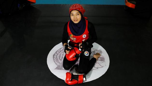 Kawsar Sherzad, 17, a Muay Thai athlete, seen at a club in Kabul. “Afghan females have had a lot of achievements in sports so I am optimistic that the Taliban will accept these achievements,” Sherzad said. When the Taliban were last in power, they gained global notoriety for a harsh regime that forced women and girls to stay at home, restricted music and sports and imposed brutal punishments on infractions. (Mohammad Ismail / REUTERS)