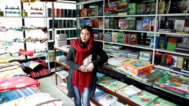 Zarghona Haidari, 22, works at a book store in Shahr Ketab Centre, in Kabul. “I'm not very much optimistic about peace in this country. I don’t think the Taliban will make a deal with the government,” Haidari said. (Mohammad Ismail / REUTERS)