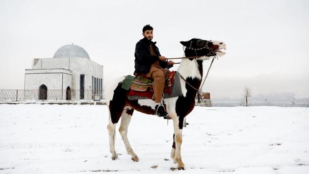 Doctor Mohammad Jawed Momand, 22 said, “Peace requires everyone to lay down their arms and think about the education and prosperity in the country.” (Mohammad Ismail / REUTERS)