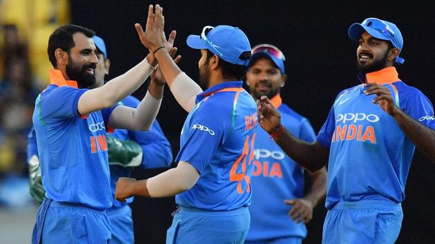 India celebrate after dismissing New Zealand's Henry Nicholls. (AFP)