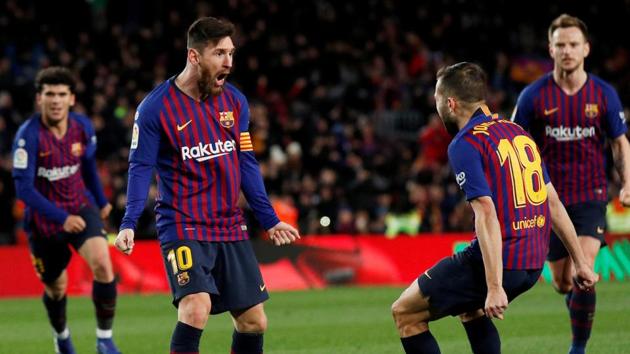 Lionel Messi (left) celebrates his second goal with Jordi Alba. (REUTERS) Lionel Messi (left) celebrates his second goal with Jordi Alba. (REUTERS)