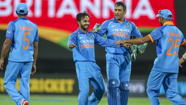 India's Kedar Jadhav, center, celebrates the wicket of New Zealand's captain Kane Williamson. (AP)