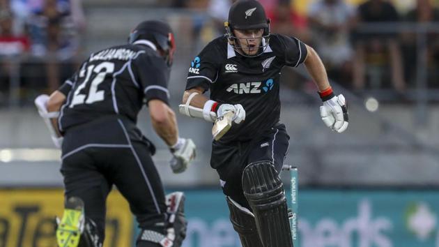 New Zealand's captain Kane Williamson, left, and Tom Latham run against India. (AP)