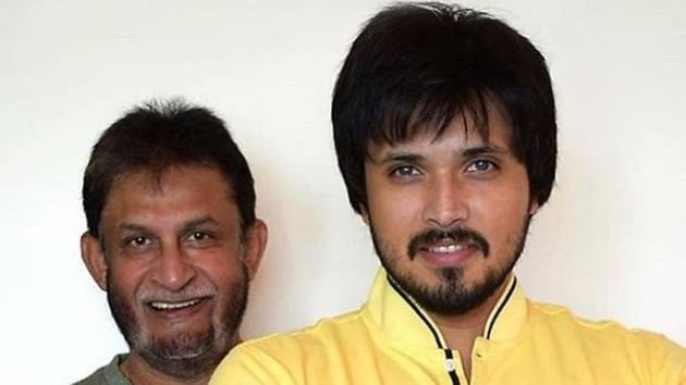 Like father like son: Chirag Patil poses with dad Sandeep.