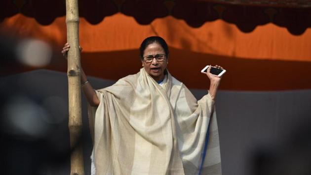Amid an unprecedented tussle between the centre and the state government in West Bengal, chief minister Mamata Banerjee continued her dharna against the centre at Esplanade in Kolkata. The sit-in protest is against the move of the CBI to question Kolkata Police commissioner Rajeev Kumar in the chit fund scam yesterday. The CBI officials were detained by local police, but released later. (Arijit Sen / HT Photo)