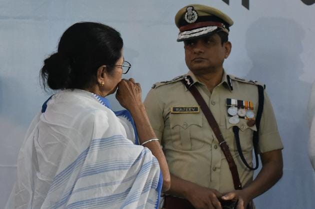 Kolkata police commissioner Rajeev Kumar with West Bengal Chief Minister Mamata Banerjee during West Bengal and Kolkata Police award ceremony at Esplanade in Kolkata on Monday. (Photo by Arijit Sen/Hindustan Times)(Arijit Sen/HT Photo)