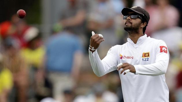 Sri Lanka's Dinesh Chandimal passes the ball to his bowler during their cricket test match against Australia in Canberra, Friday, Feb. 1, 2019 (AP) Sri Lanka's Dinesh Chandimal passes the ball to his bowler during their cricket test match against Australia in Canberra, Friday, Feb. 1, 2019 (AP)
