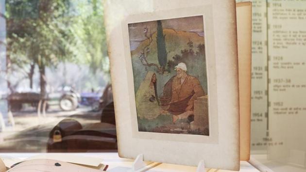 A folio shows Abanindranath Tagore’s illustration of ‘The Rubaiyat’ by Omar Khayyam, from a set that appeared in Edward Fitzgerald’s 1859 translation. Entering the first room on the ground floor, Navratna showcases nine of India’s leading artists, including the three Tagore brothers Rabindranath, Gaganendranath and Abanindranath. Old photographs, commemorative stamps and artistic objects line the hallway. (Paroma Mukherjee / HT Photo) 