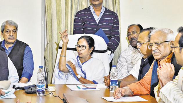 West Bengal Chief Minister Mamata Banerjee chairs a cabinet meeting in a traffic police outpost near the site of her dharna in Kolkata to protest the CBI's attempt to question the Kolkata Police commissioner in connection with chit fund scams,(PTI)