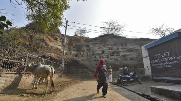 Rakhigarhi, a village in Haryana, abounds with the remains of the Indus Valley Civilisation. Some archaelogists peg it as the biggest site of the civilisation that flourished from 5500 BC to 1500 BC. Locals here are accustomed to visits by scholars and historians; so much so that some even give visitors a tour of the past that continues to co-habit their immediate surroundings. (Burhaan Kinu / HT Photo) Rakhigarhi, a village in Haryana, abounds with the remains of the Indus Valley Civilisation. Some archaelogists peg it as the biggest site of the civilisation that flourished from 5500 BC to 1500 BC. Locals here are accustomed to visits by scholars and historians; so much so that some even give visitors a tour of the past that continues to co-habit their immediate surroundings. (Burhaan Kinu / HT Photo)