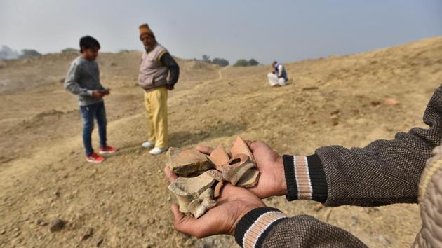 The first discovery of the remains of the Harappan Civilisation in Rakhigarhi was in the 1960s when a collector of antiquities, Acharya Bhagwan Dev, visited the village and stumbled upon earthenware in the soil here. Unable to identify them, he invited Professor Suraj Bhan who was studying the Harappan era, to examine his findings. It was Bhan who established that the antiquities dated to the Indus Valley Civilisation. (Burhaan Kinu / HT Photo) The first discovery of the remains of the Harappan Civilisation in Rakhigarhi was in the 1960s when a collector of antiquities, Acharya Bhagwan Dev, visited the village and stumbled upon earthenware in the soil here. Unable to identify them, he invited Professor Suraj Bhan who was studying the Harappan era, to examine his findings. It was Bhan who established that the antiquities dated to the Indus Valley Civilisation. (Burhaan Kinu / HT Photo)