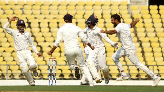 Vidarbha bowler Aditya Sarvate celebrates after taking wicket of Saurashtra batsman Cheteshwar Pujara.(Sunny Shende)