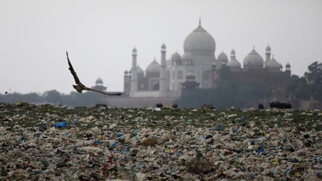 Garbage is seen on the polluted banks of the river Yamuna near the historic Taj Mahal, Agra. Three in five monitored rivers across the country are polluted(REUTERS)