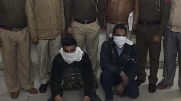 The accused, Pankaj Bhardwaj, and his co-worker, Naseem Ahmed, in police custody. (HT Photo) The accused, Pankaj Bhardwaj, and his co-worker, Naseem Ahmed, in police custody. (HT Photo)