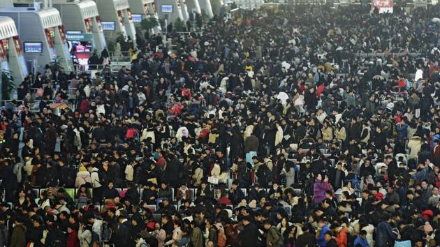 The holiday in mainland China is marked by the biggest annual travel boom as hundreds of millions of people visit their home towns or travel abroad. The railway ministry forecast mainland travellers would make 413 million trips during the three-week period around the holiday. (Chinatopix via AP) The holiday in mainland China is marked by the biggest annual travel boom as hundreds of millions of people visit their home towns or travel abroad. The railway ministry forecast mainland travellers would make 413 million trips during the three-week period around the holiday. (Chinatopix via AP)